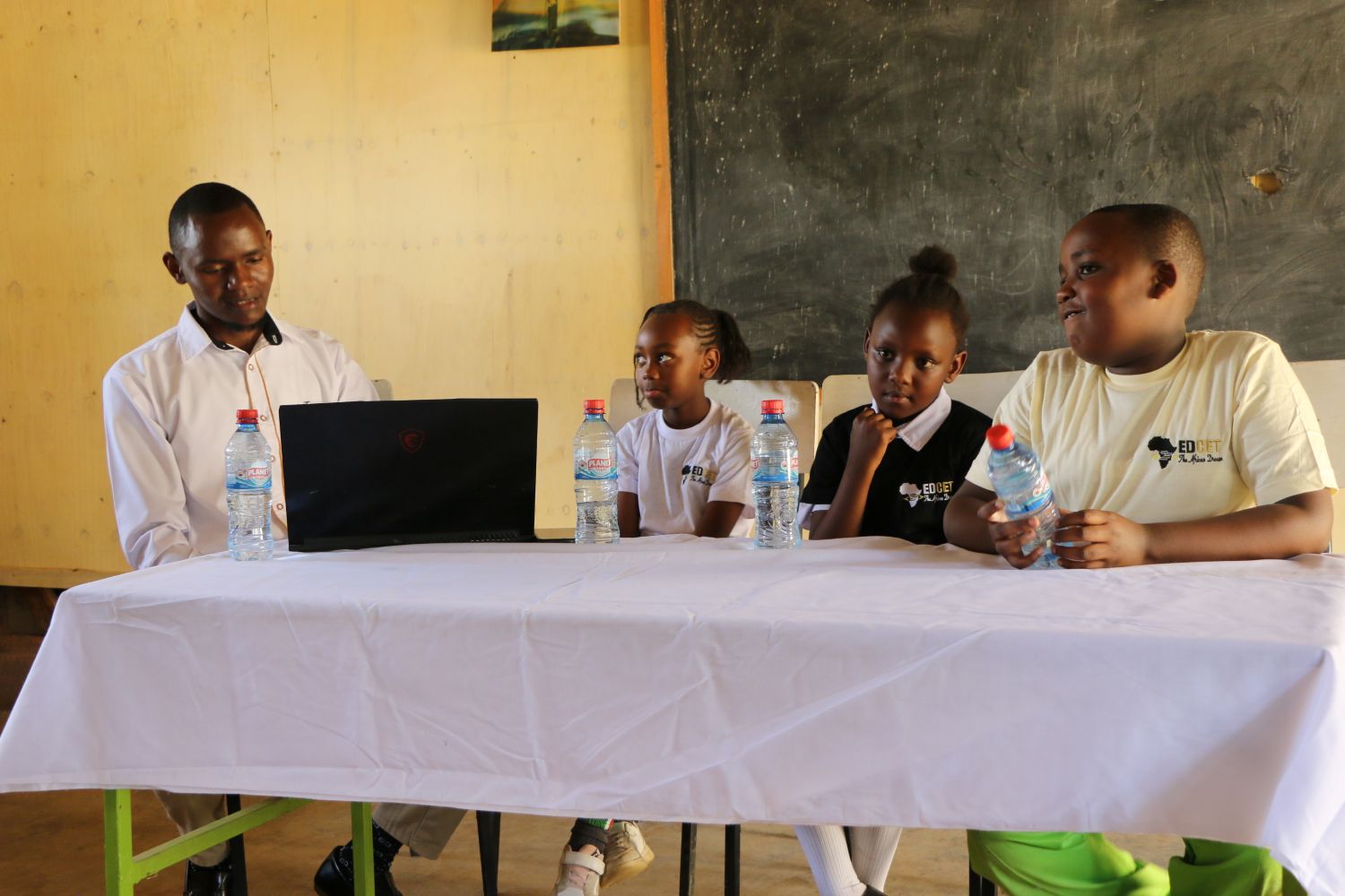 Techweavers academy learners in a peer to peer training in a neighboring school - communication skills for children