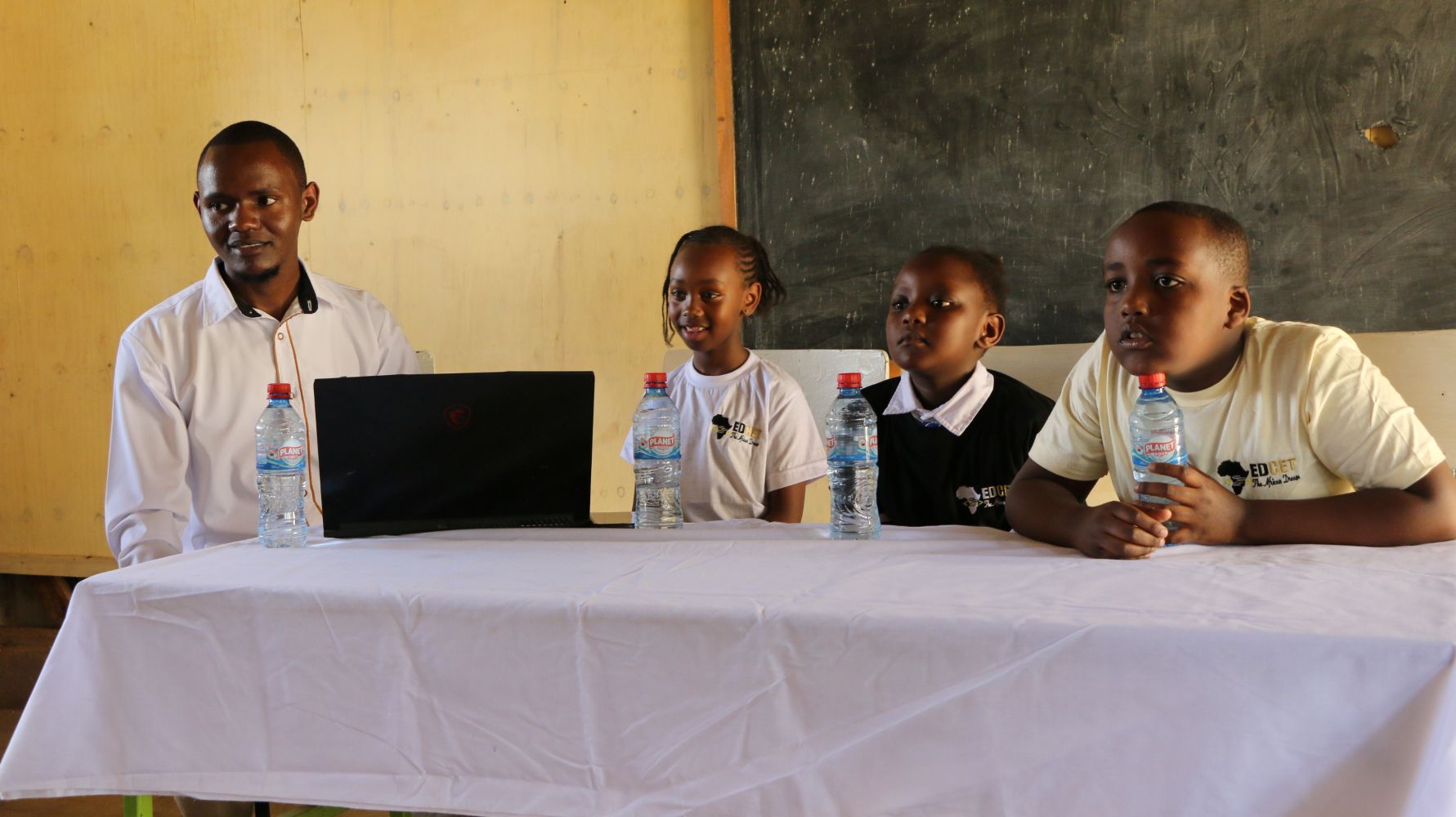 Techweavers academy learners in a peer to peer training in a neighboring school